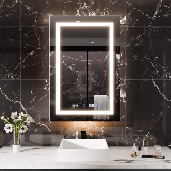 Elegant bathroom with LED backlit mirror cabinet against a black marble wall