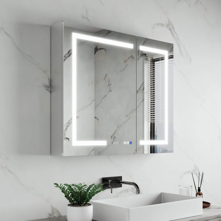 LED bathroom mirror with illuminated rectangular design on a white background