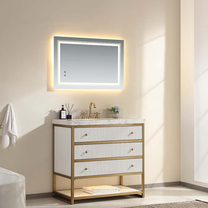 Modern white bathroom vanity with one piece ceramic sink and gold accents